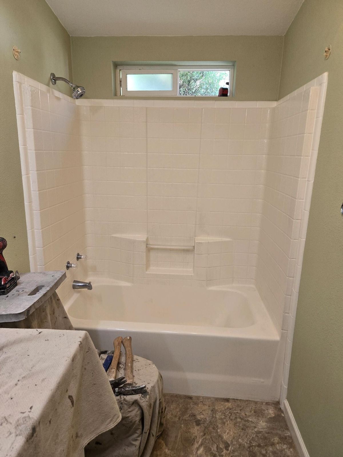 Tub converted to a walk-in shower, before