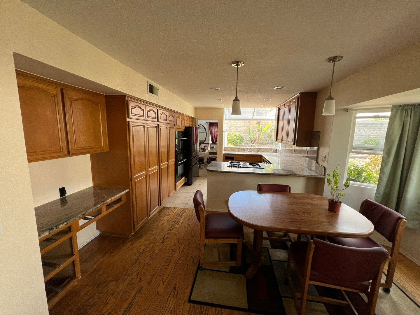 Honey oak kitchen refaced in white, before