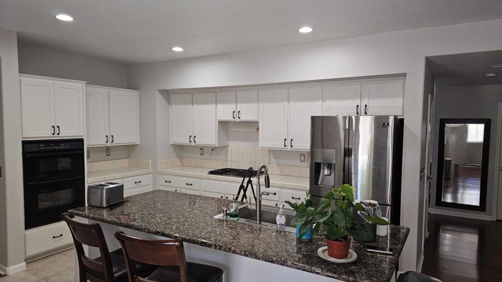 Oak kitchen refaced in white, after